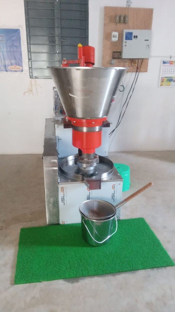 Stainless steel oil press at the S R Enterprises unit